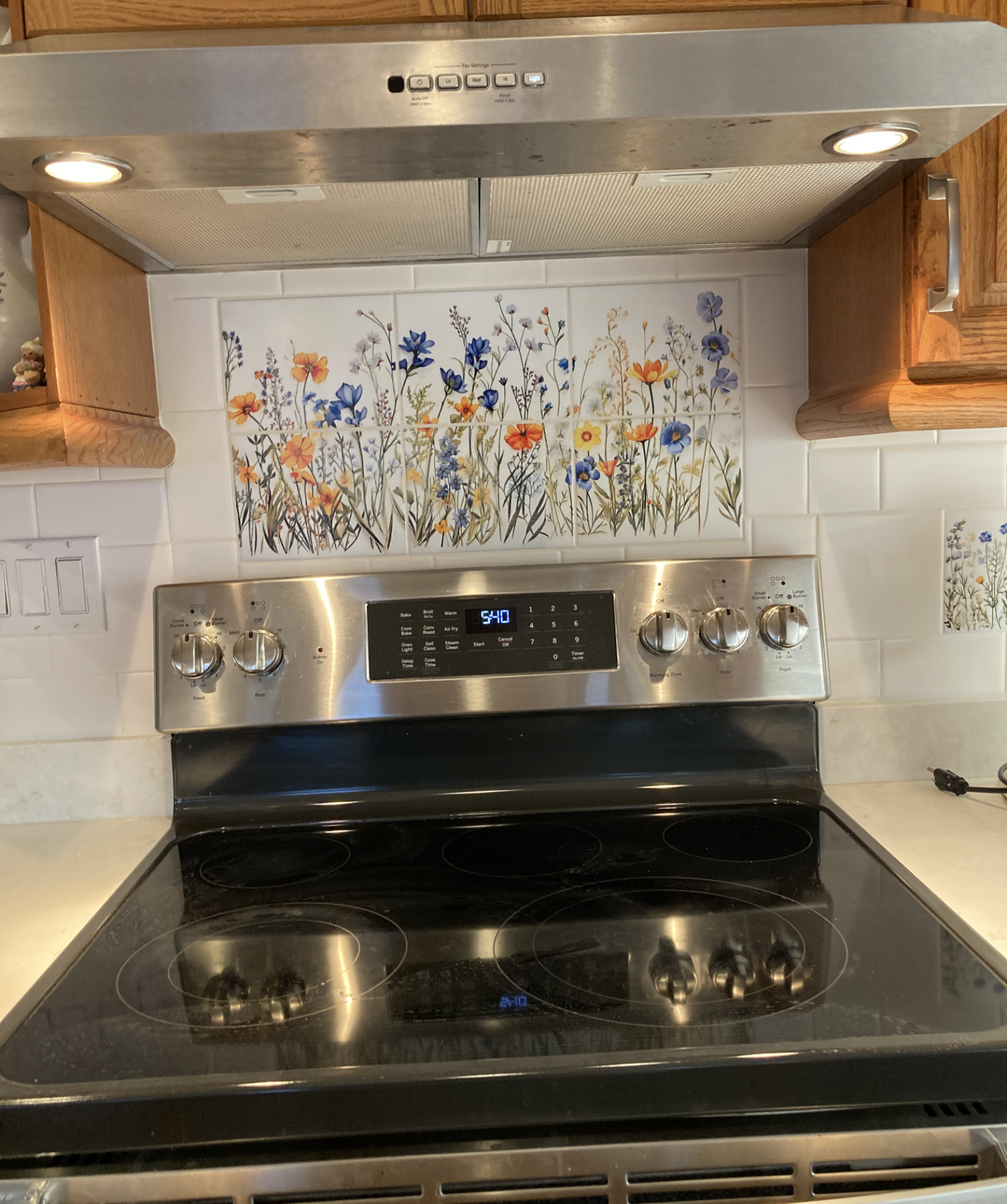 A set of 8" by 6" Field Flowers Ceramic Tiles or a 12" by 24" mural.